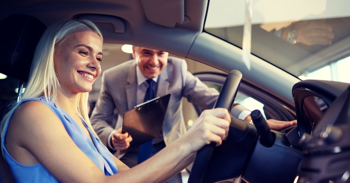 Happy Woman Getting Ready For A Test Drive