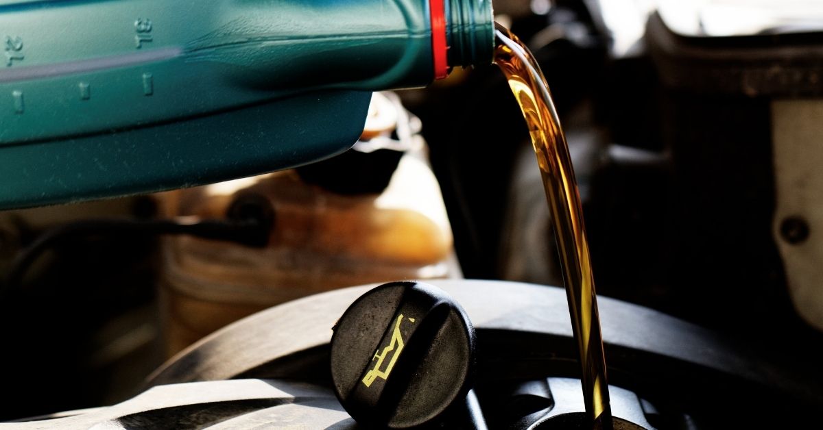 New Oil Being Poured Into An Engine | How To Extend The Life Of Your Vehicle