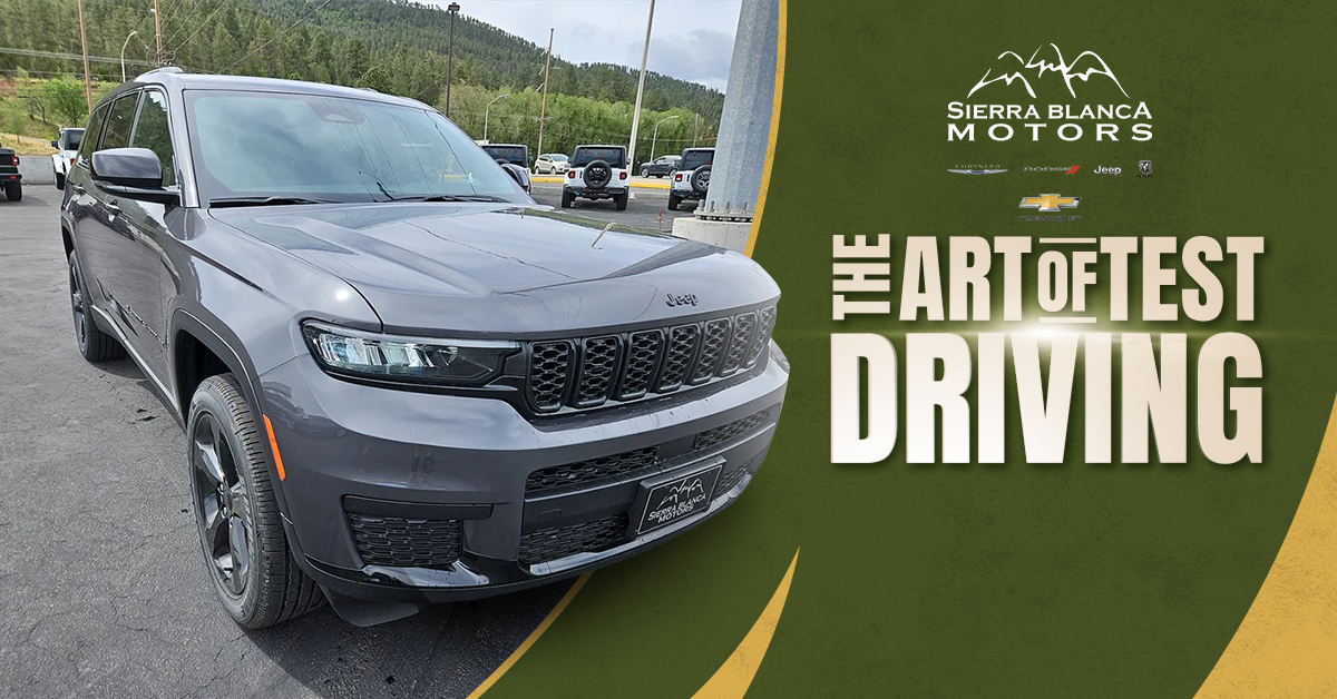 Gray 2023 Jeep Grand Cherokee Parked At Sierra Blanca Motors On The Left Side of The Image | Green and Yellow Background on the Right Side with The Sierra Blanca Motors Logo on the Top With the Blog Title Below "The Art of Test Driving"