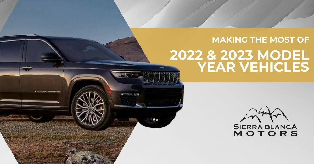 Jeep Grand Cherokee Parked With a Rock and Boulder Background | Making The Most of 2022 & 2023 Model Year Vehicles | Sierra Blanca Motors